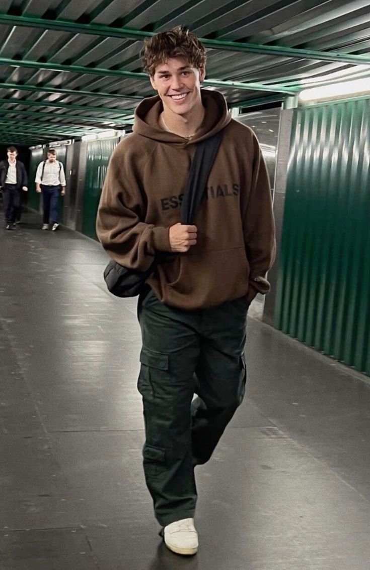 Brown oversized hoodie with dark green cargo pants